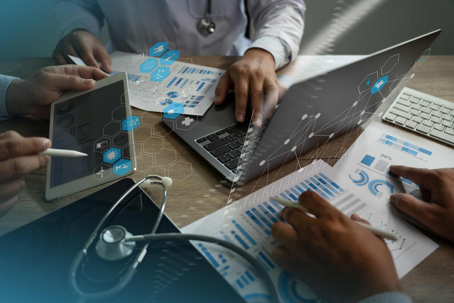 Tablet and laptop displaying health data dashboards